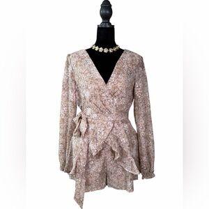 Francesca's Collections Blush Beige Floral Wrap Romper